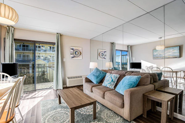 Second-floor, ocean-view condo with beach views, pool access, washer/dryer & AC