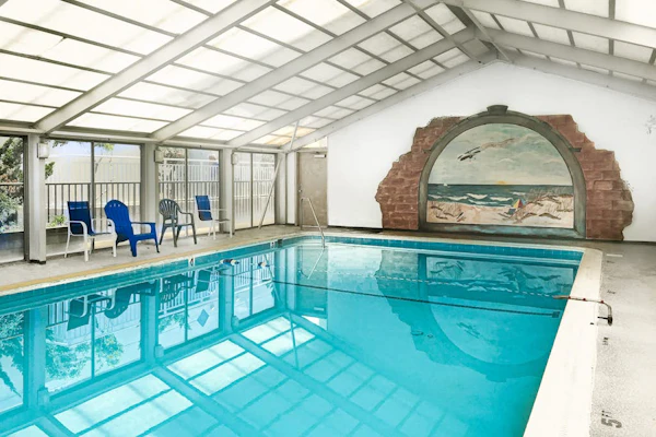Second-floor, ocean-view condo with beach views, pool access, washer/dryer & AC
