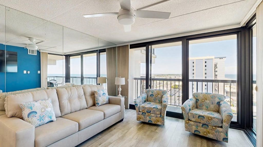 Stunning beachfront condo with balcony, pools, game room, sauna & gym