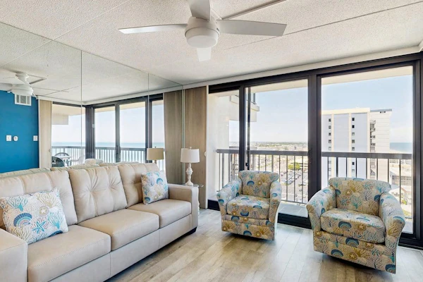 Stunning beachfront condo with balcony, pools, game room, sauna & gym