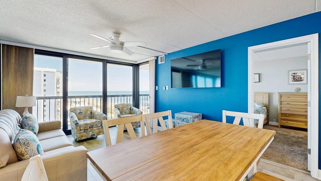 Stunning beachfront condo with balcony, pools, game room, sauna & gym