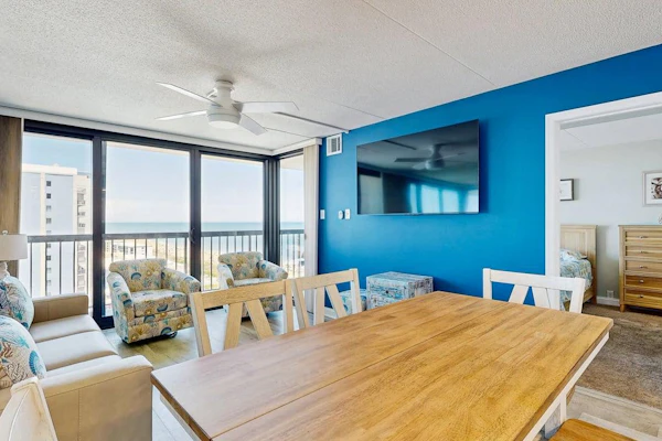 Stunning beachfront condo with balcony, pools, game room, sauna & gym