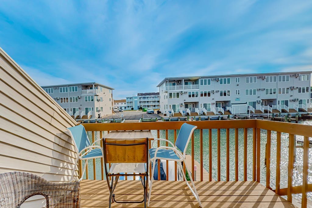 Waterfront condo with scenic balcony, games, fireplace, & W/D - dog-friendly