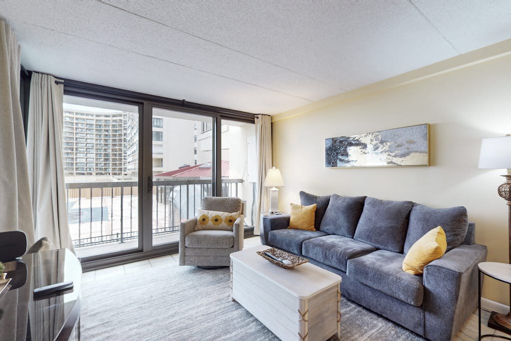Ocean-view 1st-floor condo with electric fireplace, pools & gym