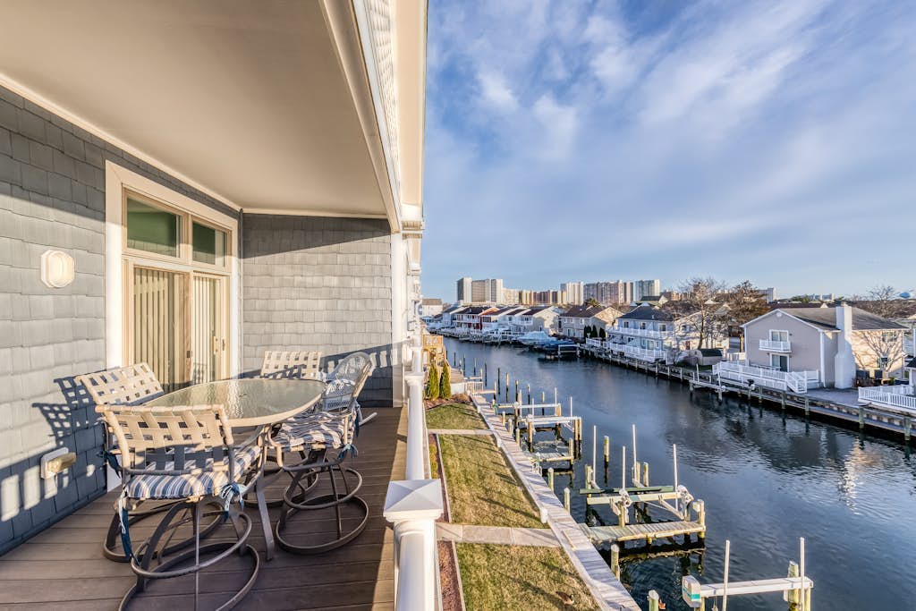 Beautiful, bay-view condo with pools, balcony, beach gear, AC, & fireplace