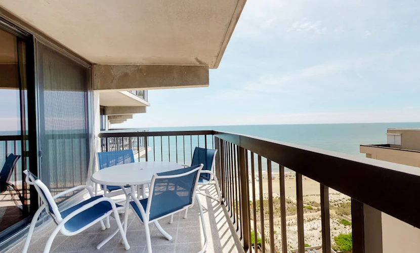 Astounding beach condo with balcony, pools, gym, game room & tennis