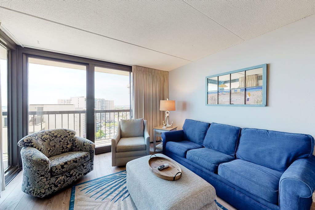 Astounding beach condo with balcony, pools, gym, game room & tennis