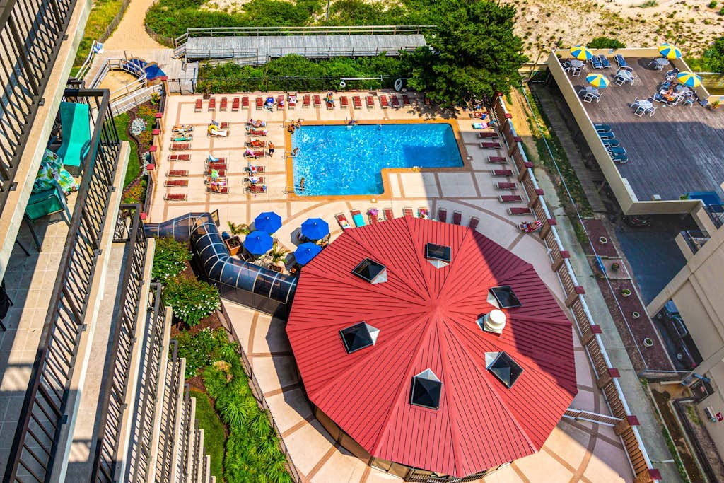 Astounding beach condo with balcony, pools, gym, game room & tennis