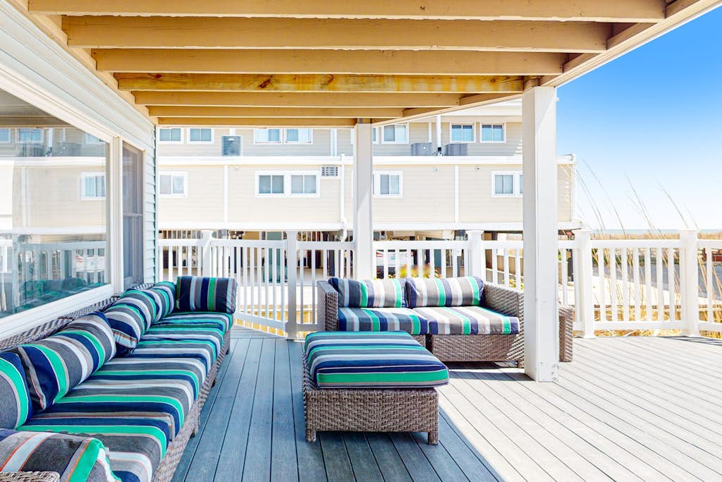 Renovated home with partial ocean view, decks, W/D, AC, WiFi - walk to the beach
