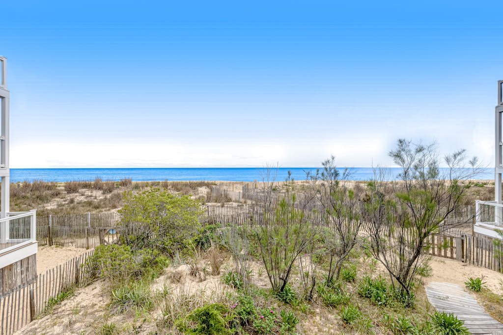 Oceanfront Happy House duplex with WiFi, W/D, ocean views, & beach access