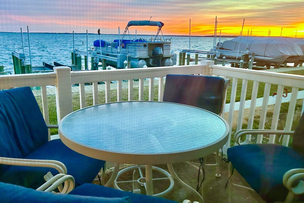 Waterfront condo with bay views, private deck, & on-site pool