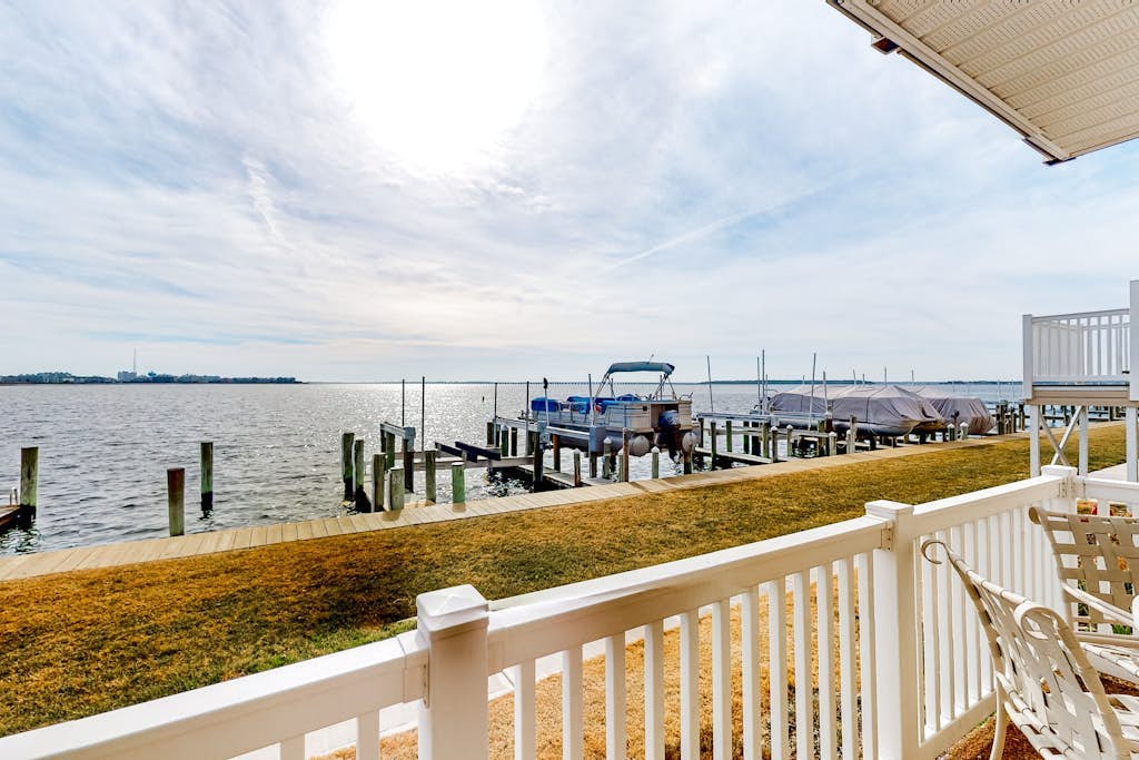Waterfront condo with bay views, private deck, & on-site pool