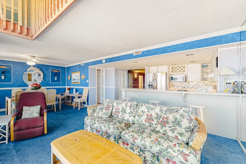 Stylish beach condo with prime beach views, balcony, pools, gym & sauna