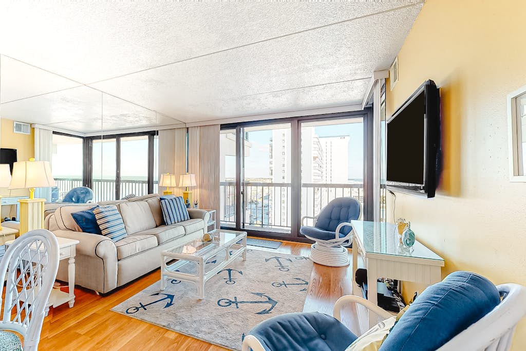 Updated, ocean-view condo with balcony, pools, saunas, game room & gym