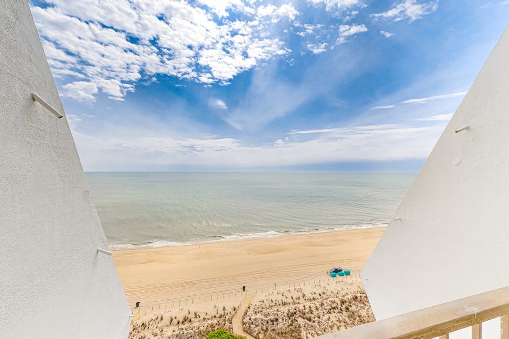 Newly updated oceanfront condo with enclosed balcony, AC, WiFi & shared pool