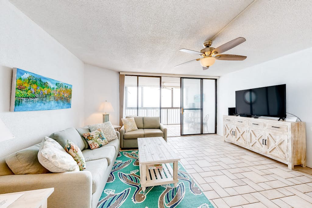 Newly updated oceanfront condo with enclosed balcony, AC, WiFi & shared pool