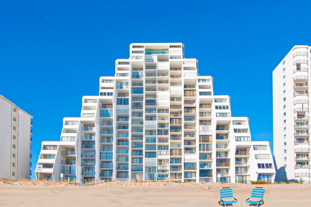Oceanfront Condo with Covered Balcony, WiFi, AC, Laundry & Shared Pool