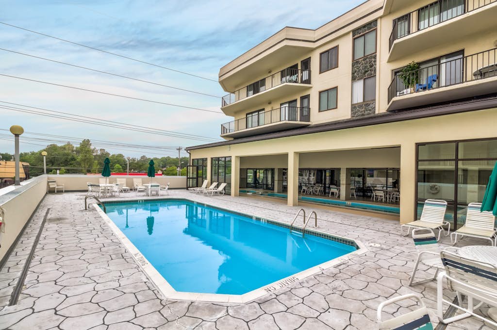 Ocean block condo with sunny balcony, central AC, laundry and pools