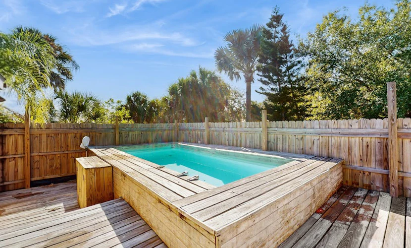 Gorgeous canal front home, above ground pool & close to beach