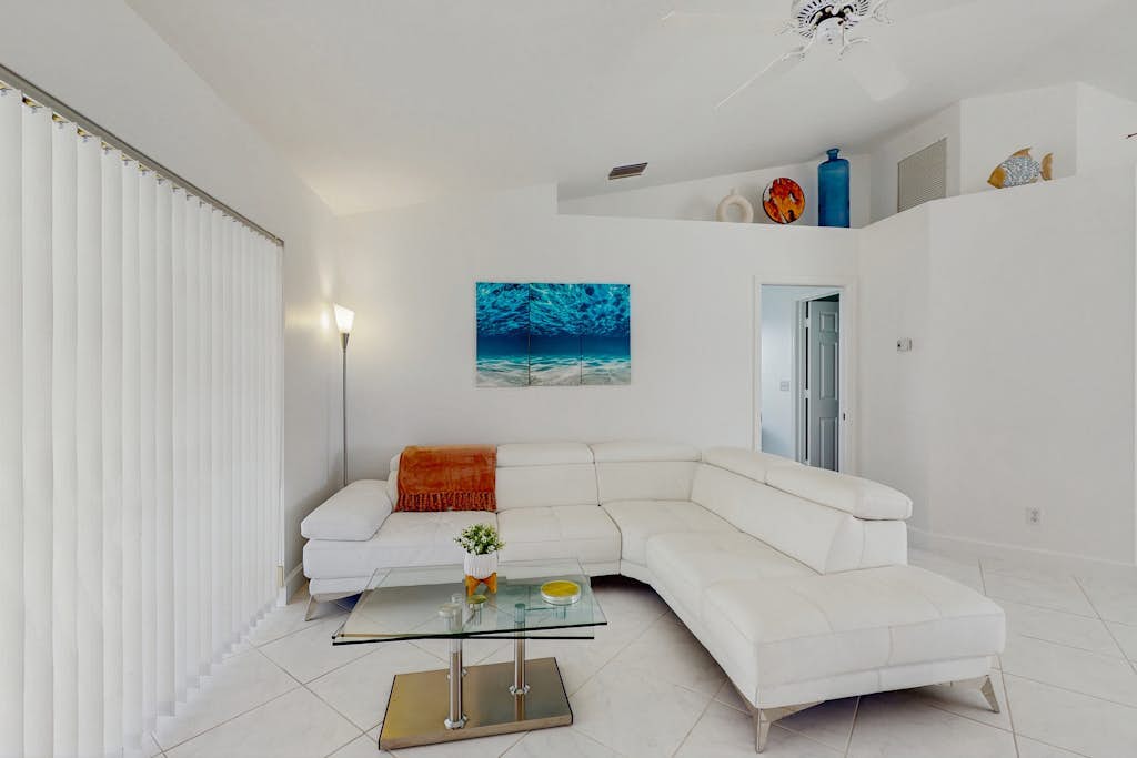 Coastal home with pool, lanai, and washer and dryer