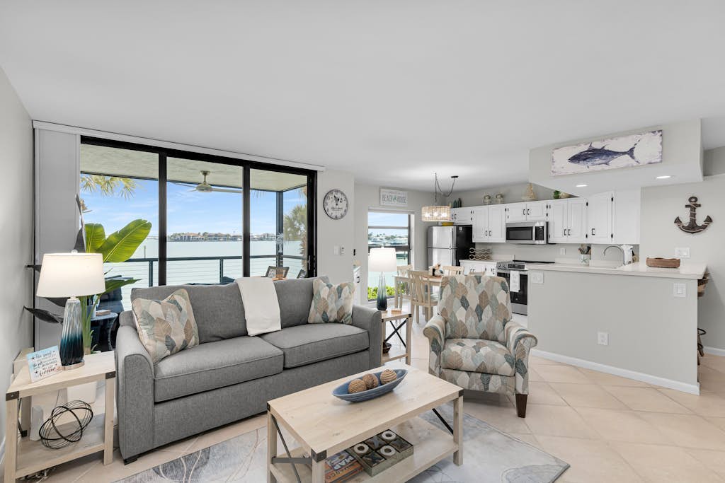Water view condo with shared pool, panoramic balcony views, and WIFI
