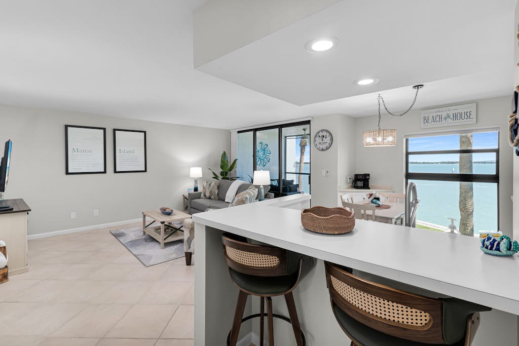 Water view condo with shared pool, panoramic balcony views, and WIFI
