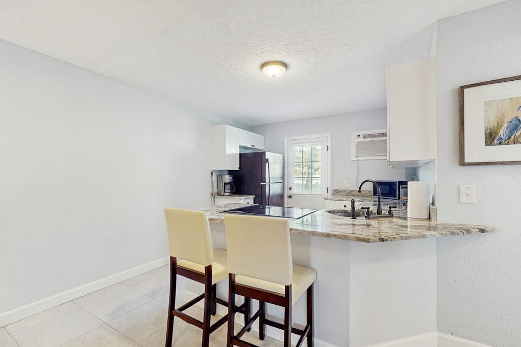 Dog-Friendly Quadruplex w/Snowbird Discounts and Private Beach Access
