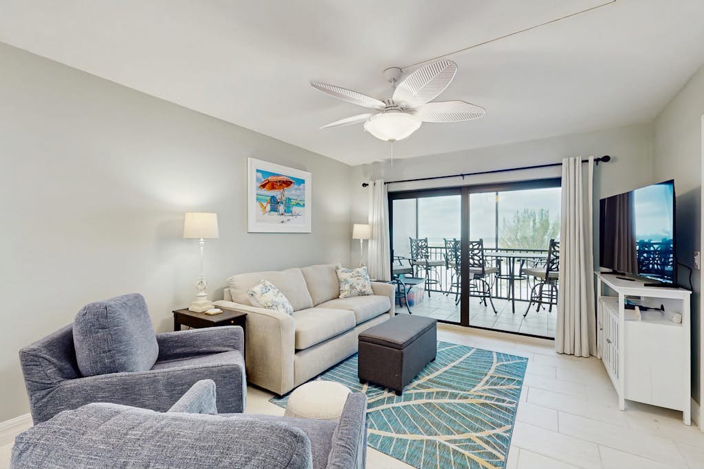 Beachfront condo with screened balcony, community pool, and internet