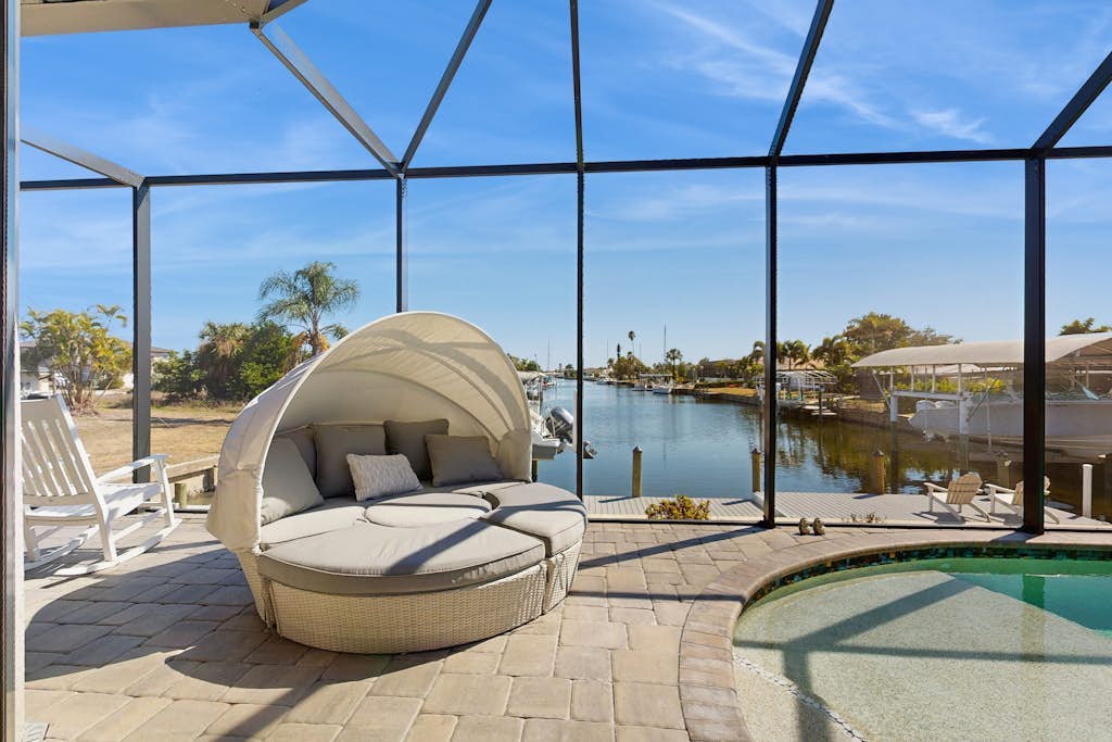 Ultimate waterside retreat with private dock, lanai, pool & spa, BBQ and WiFi