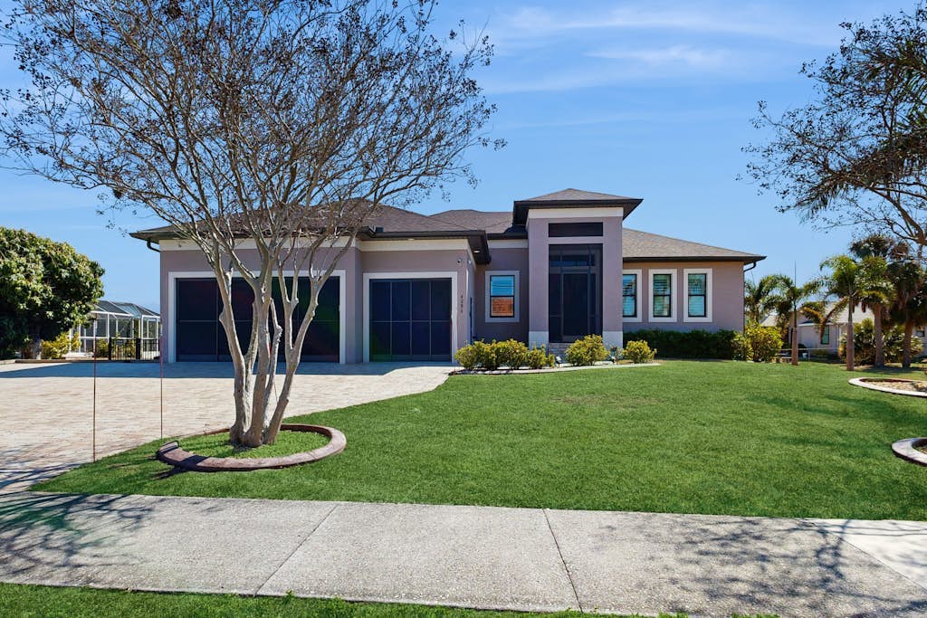 Ultimate waterside retreat with private dock, lanai, pool & spa, BBQ and WiFi