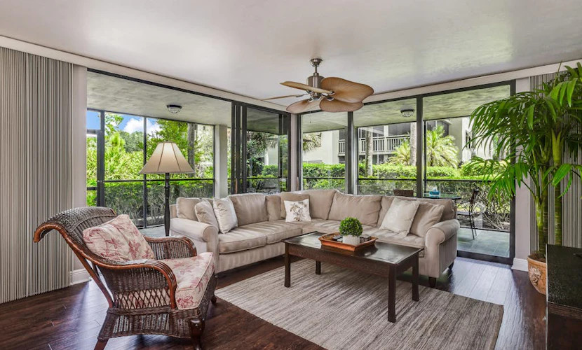 Spacious, air-conditioned condo with private W/D, beach shuttle, & central AC