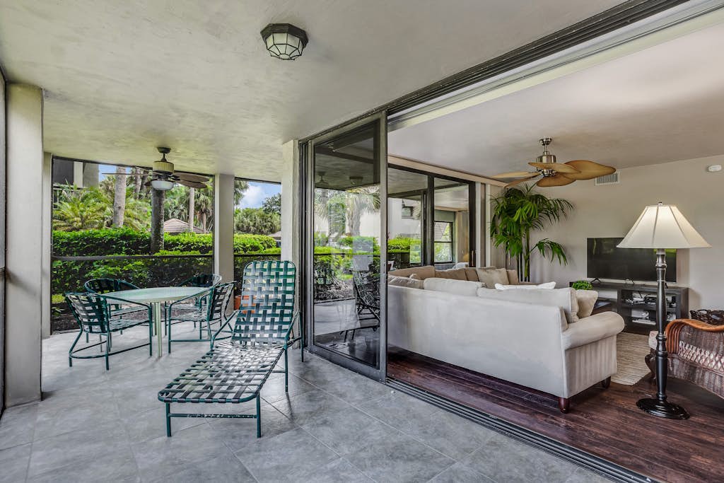 Spacious, air-conditioned condo with private W/D, beach shuttle, & central AC