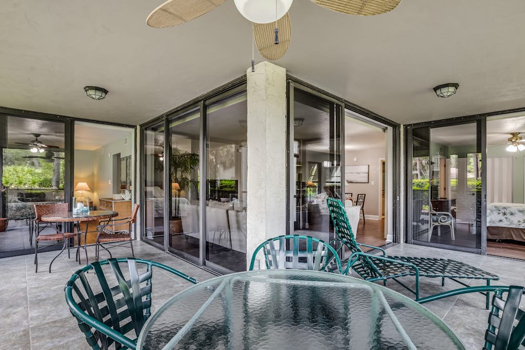 Spacious, air-conditioned condo with private W/D, beach shuttle, & central AC