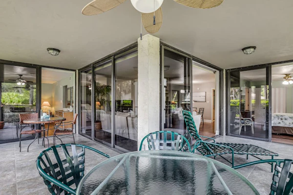 Spacious, air-conditioned condo with private W/D, beach shuttle, & central AC