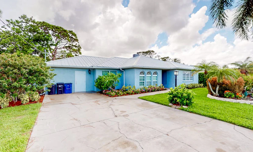 Fantastic waterfront escape with hot tub, lanai, boat lift, WiFi & central AC