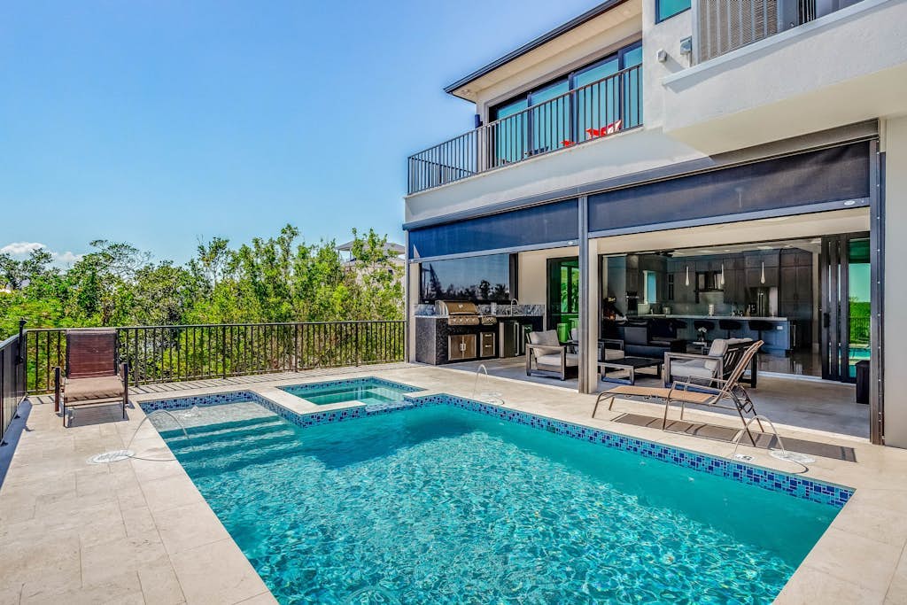 Spacious modern home close to beach with pool, central AC, & washer/dryer