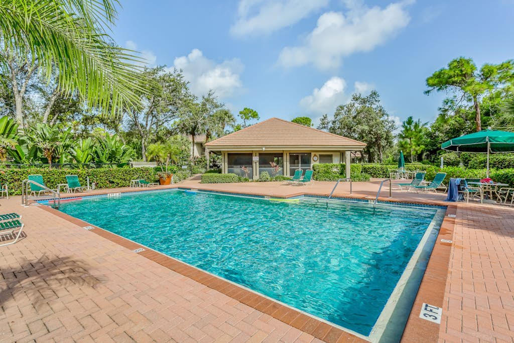 2nd-floor condo with private beach access, lanai, and access to heated pool