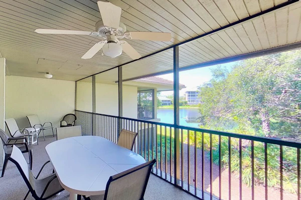 Gated resort community condo with water views, pool, hot tub, & balcony