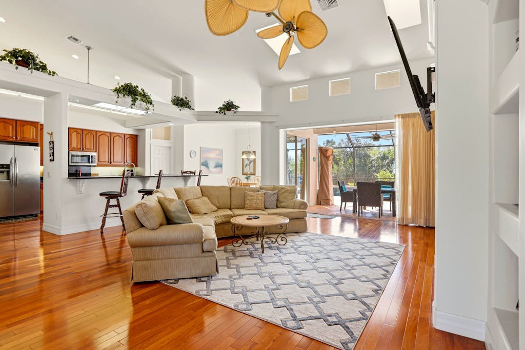 Waterfront home with private heated pool, dock, firepit, grill, bikes, fireplace