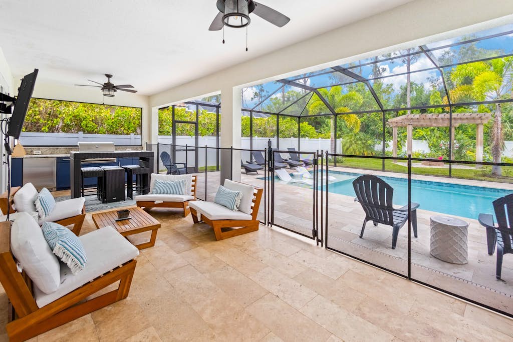 Designer getaway with private pool, luxe lanai, home office & outdoor kitchen