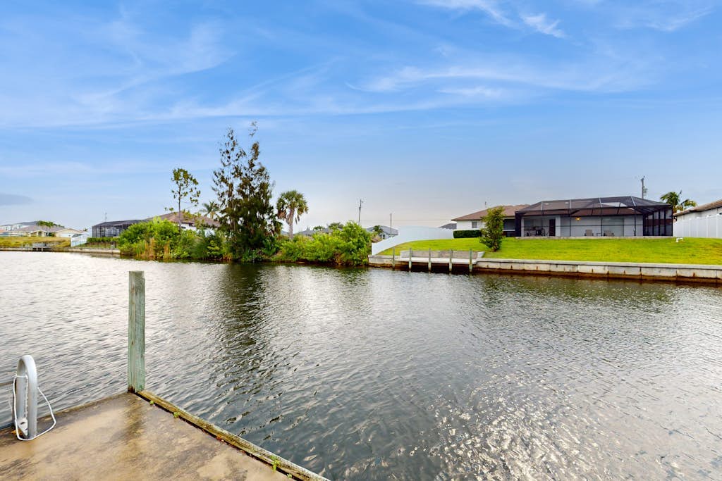 Luxe Tropical Retreat with Screened Lanai, Private Pool, Dock & Billiards