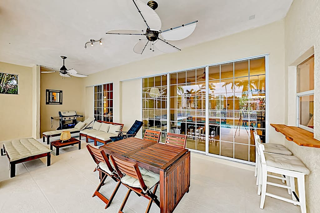 Dog-friendly canal-front home with a private pool & dock in a prime location