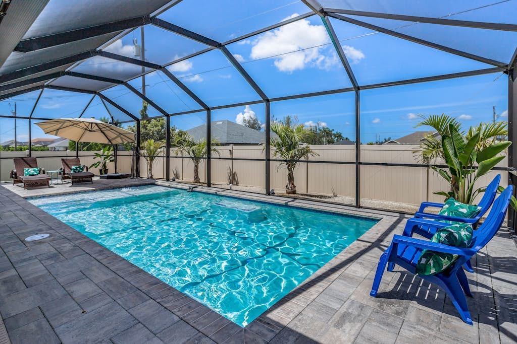 Private home with heated pool, screened lanai, grill, sun deck, & yard games