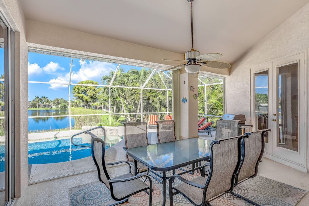 Updated lake-view luxury home with private heated pool & jetted tub