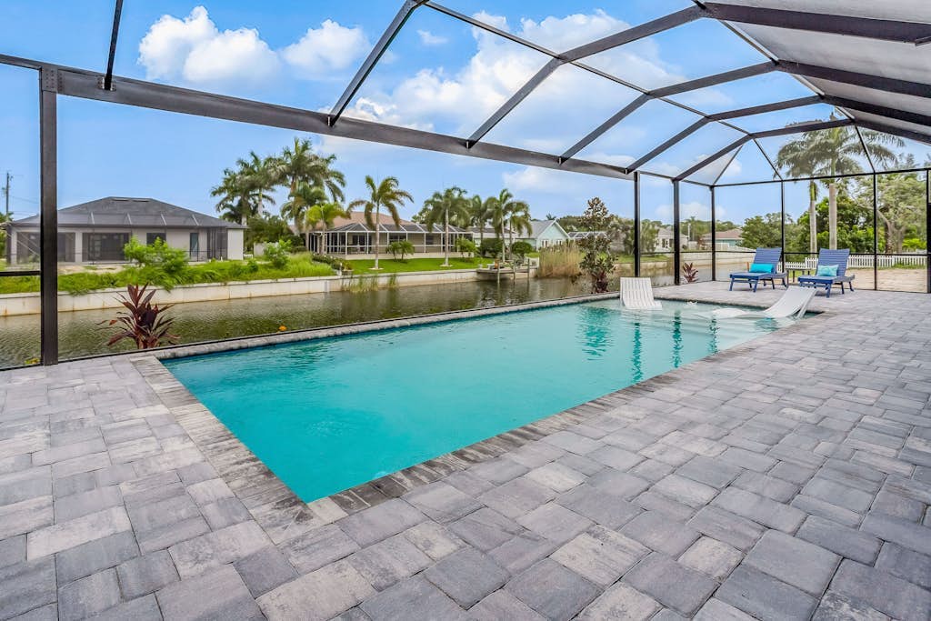 Gorgeous home with heated pool, lanai, grill, and washer/dryer