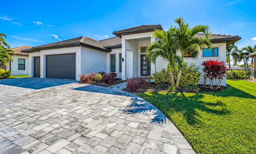 Newly-built luxury home with private infinity pool, canal views, & washer/dryer