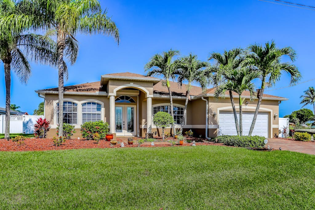 Dog-friendly home on canal with heated pool, spas, central AC, & washer/dryer