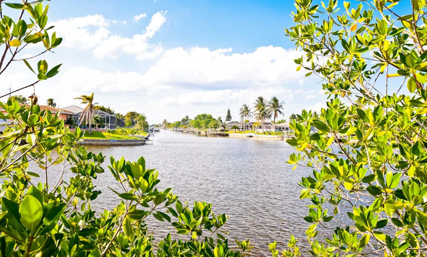 Dog-friendly lake-view getaway with pool & all-suite layout - walkable locale