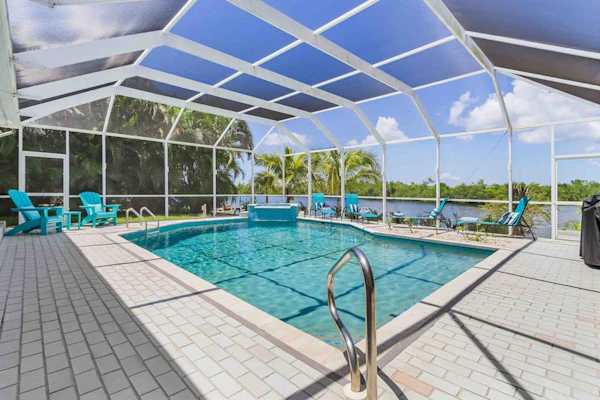 Exquisite waterfront home with private pool, hot tub, amd dock