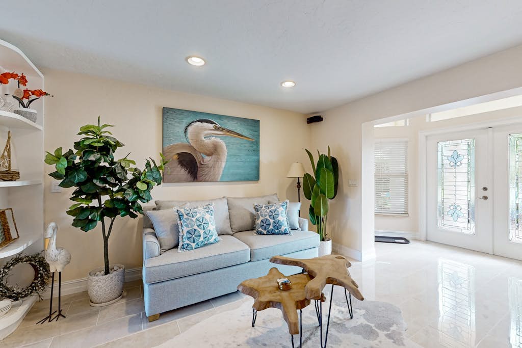 Waterfront home with private pool, lanai, dock, & tiki hut